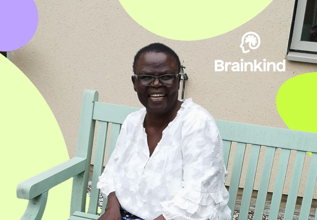 A picture of Florence. She is an adult Black woman with short hair, smiling at the camera.